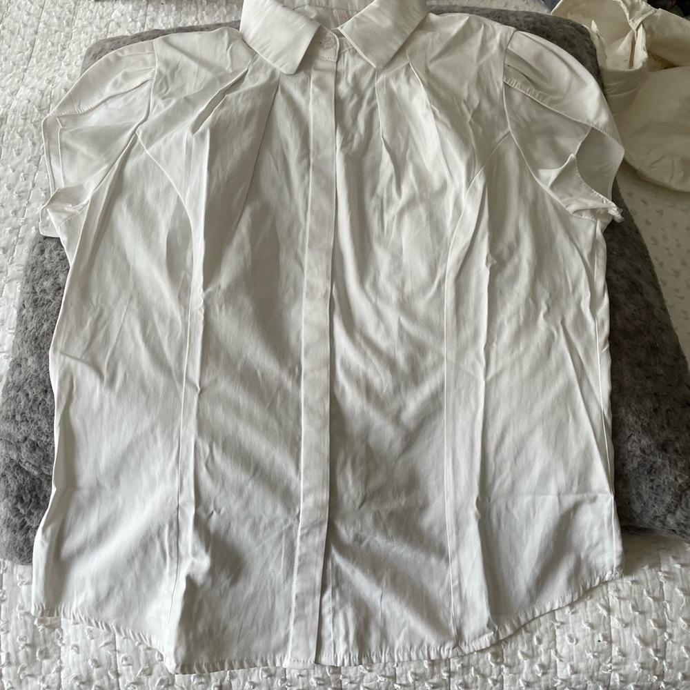 White collar shirt, buttoned down